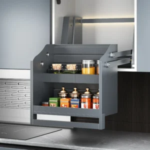 Pull down kitchen spice rack lowered above a countertop for easy access